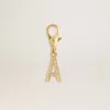 Charm con la letra A en latón dorado con cristales