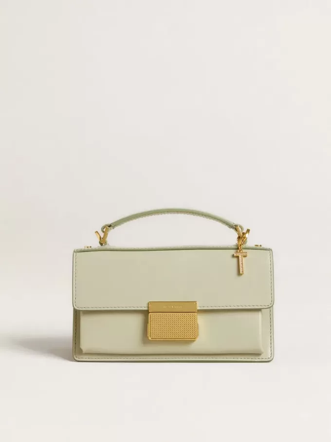 Charm con la letra T en latón dorado con cristales