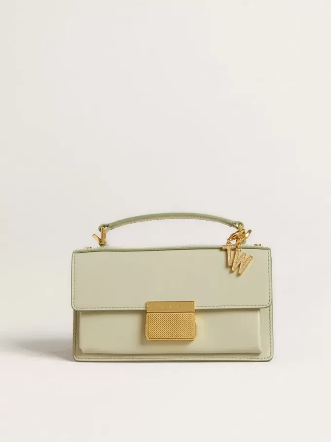 Charm con la letra T en latón dorado con cristales