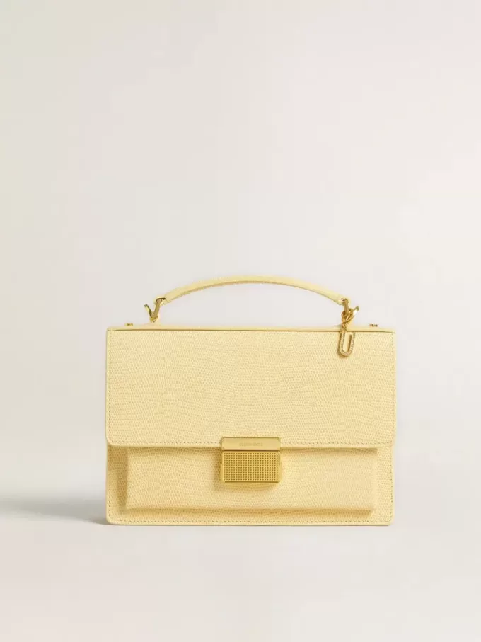 Charm con la letra U en latón dorado con cristales