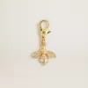 Colgante con forma de abeja en latón dorado con cristales