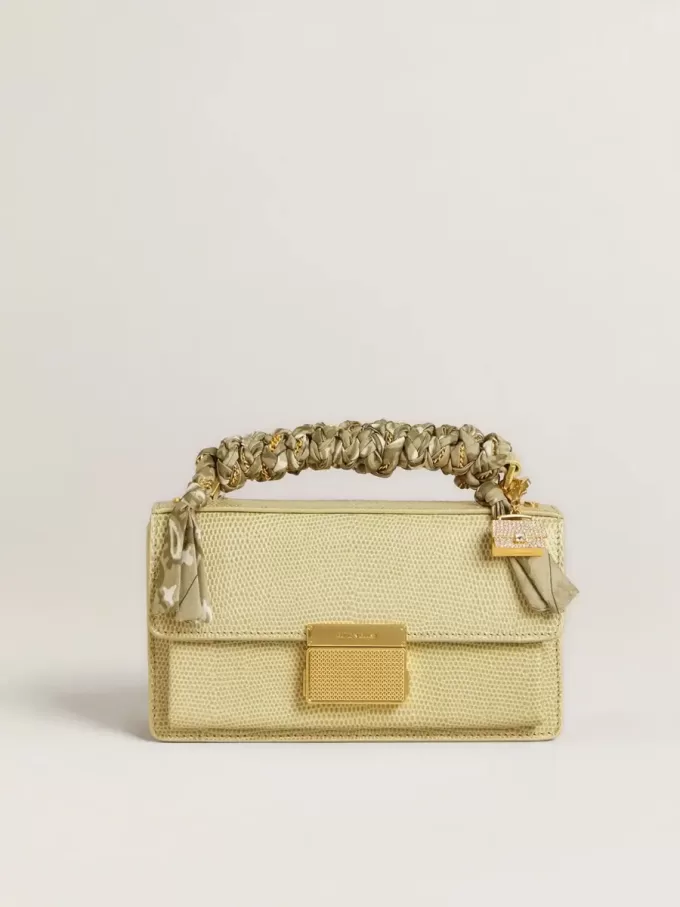 Colgante con forma de monedero en latón dorado con cristales