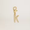 Colgante con la letra K en latón dorado con cristales