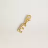 Colgante con letra E en latón dorado con cristales