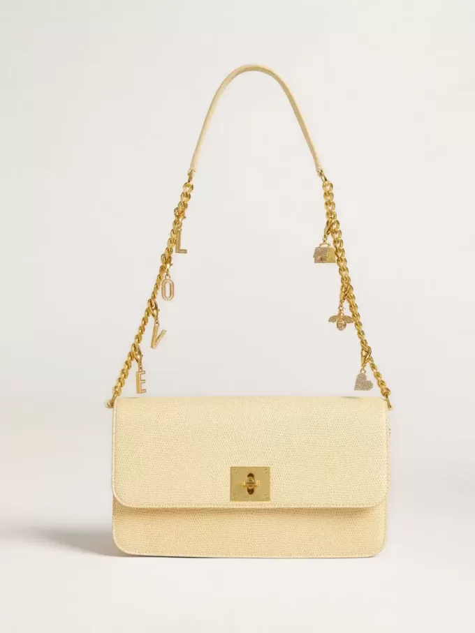 Colgante con letra V en latón dorado con cristales