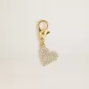 Colgante en forma de corazón de latón dorado con cristales