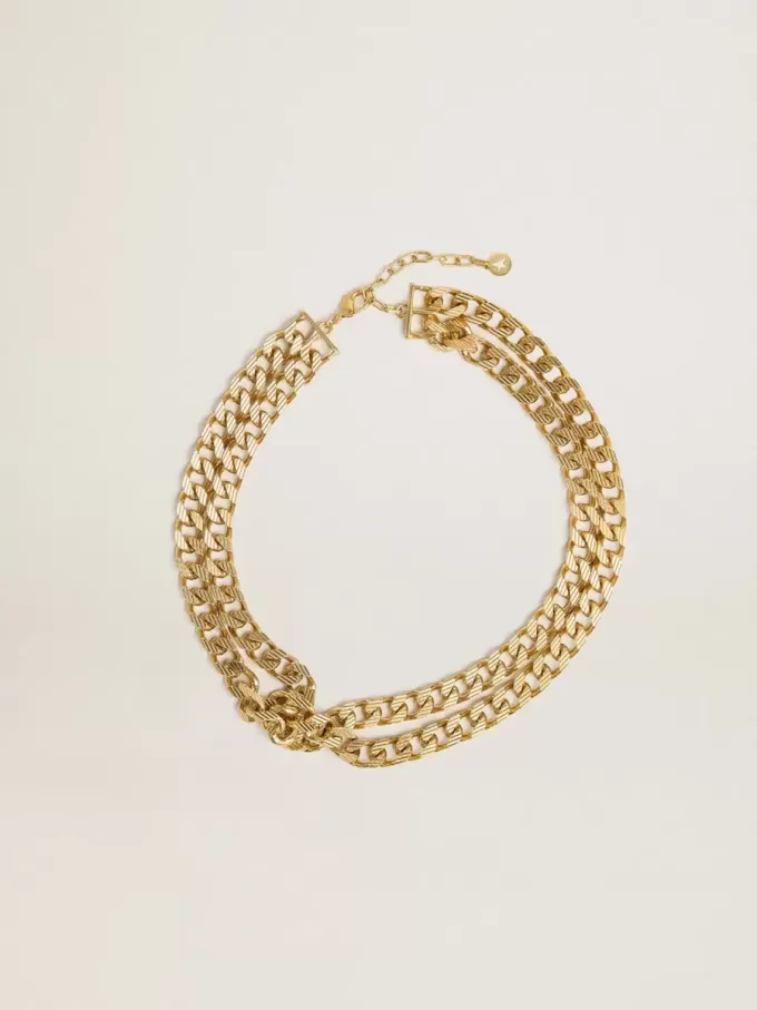 Collar de cadena trenzada en color oro antiguo con cierre en forma de estrella Collar de cadena trenzada en color oro antiguo con cierre en forma de estrella