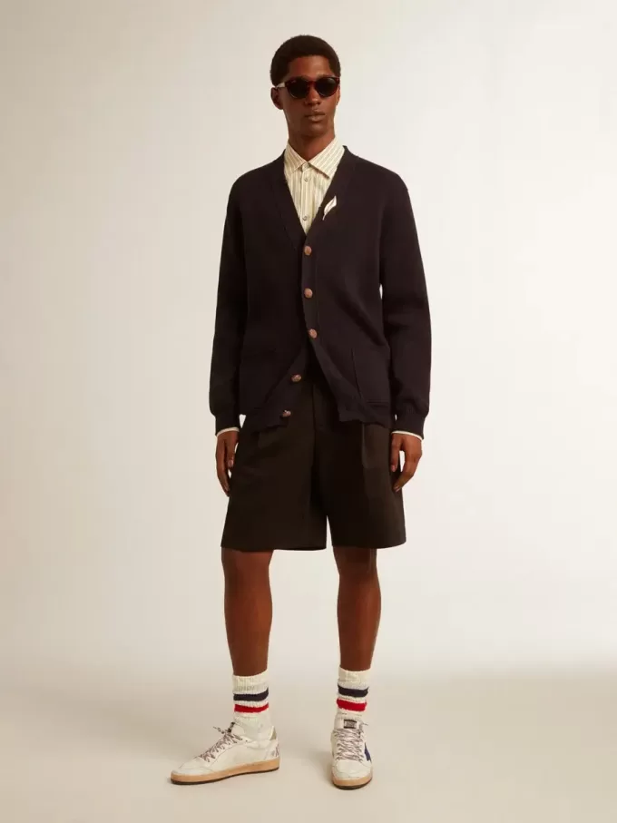 Cárdigan Golden Collection en algodón azul oscuro con acabado desgastado