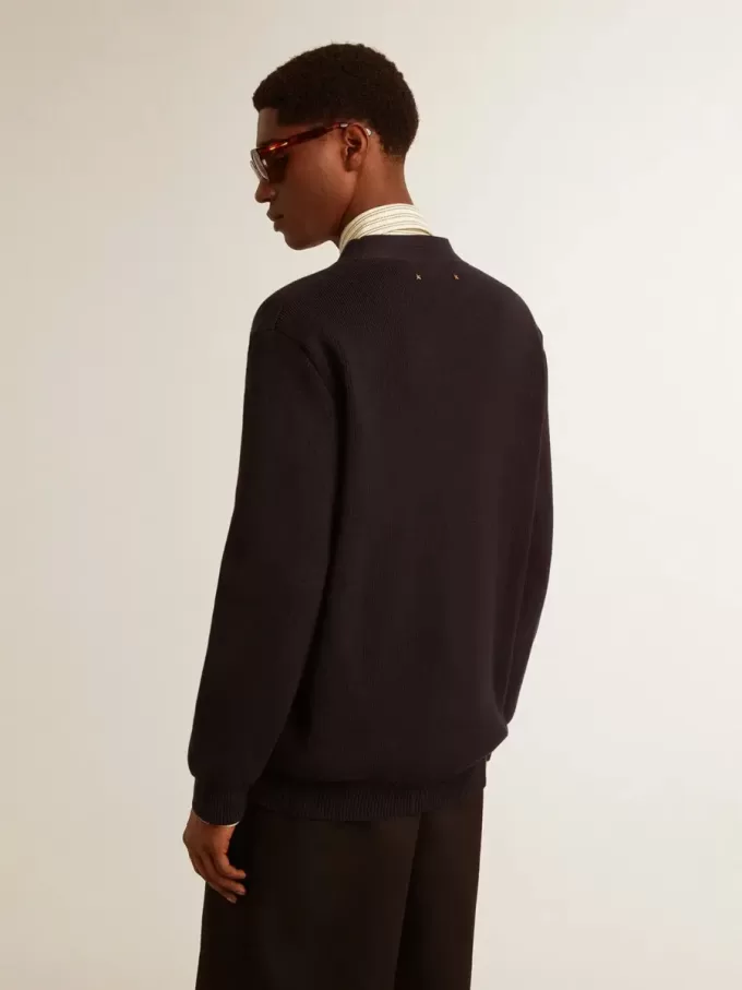 Cárdigan Golden Collection en algodón azul oscuro con acabado desgastado