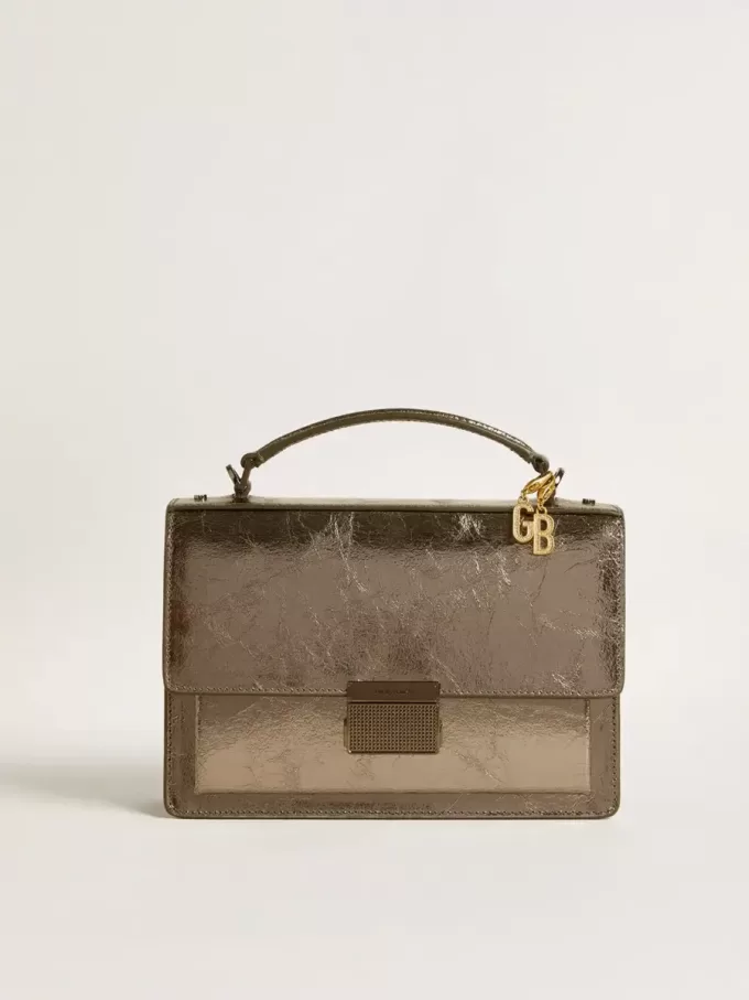 Dije con la letra G en latón dorado con cristales