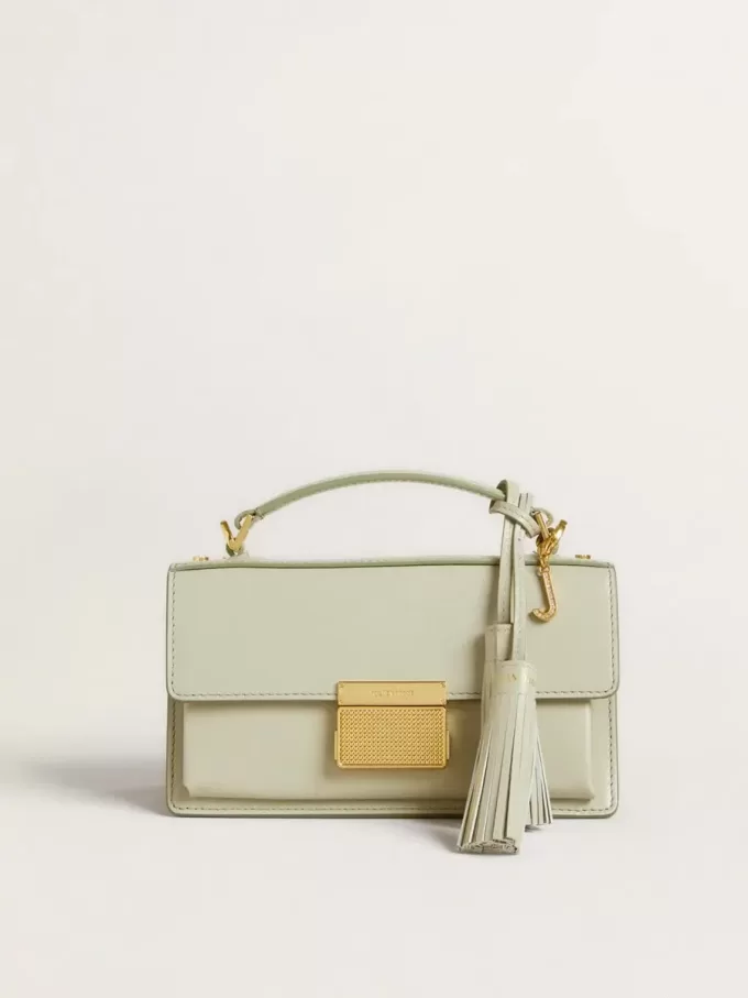 Dije con la letra J en latón dorado con cristales