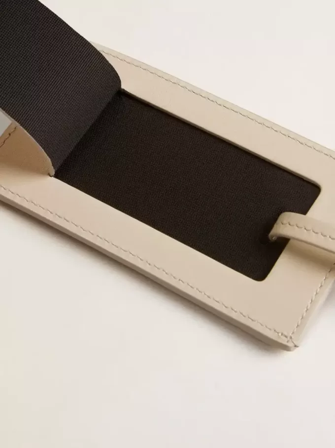 Etiqueta de equipaje blanca desgastada Etiqueta de equipaje blanca desgastada