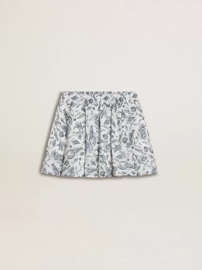 Falda blanca para niña con estampado azul Falda blanca para niña con estampado azul