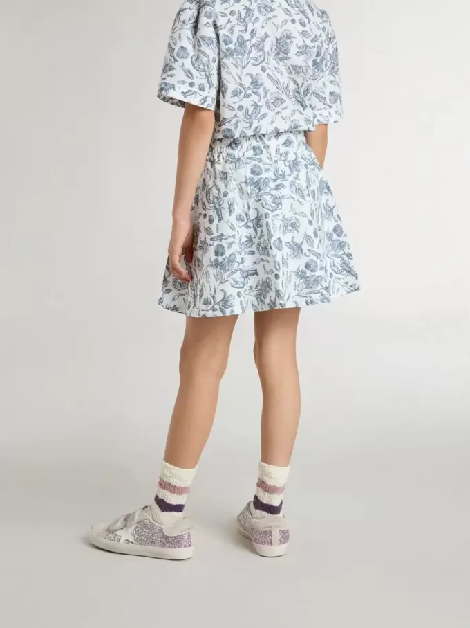 Falda blanca para niña con estampado azul Falda blanca para niña con estampado azul