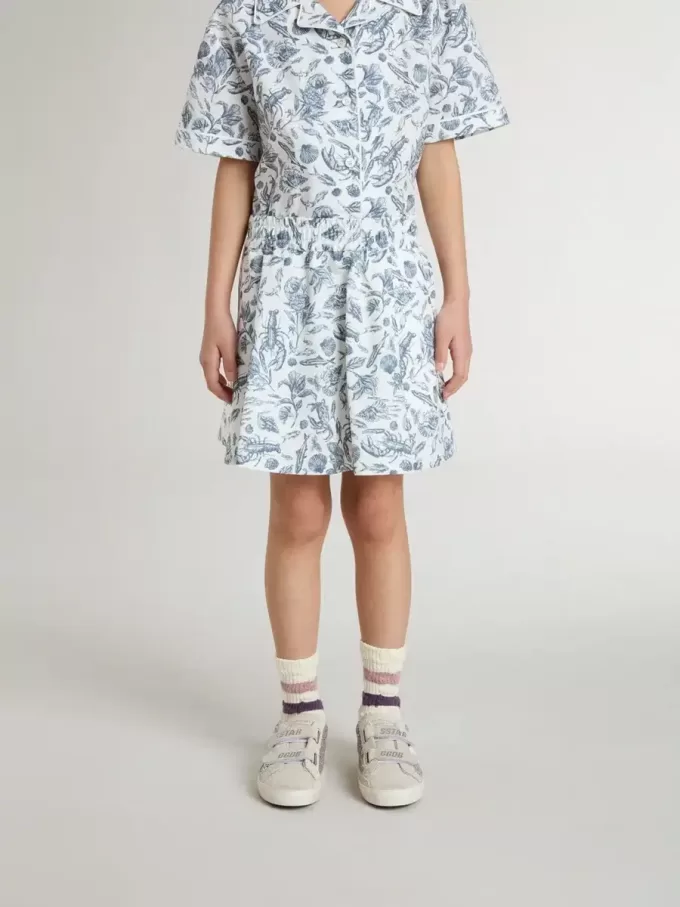 Falda blanca para niña con estampado azul Falda blanca para niña con estampado azul