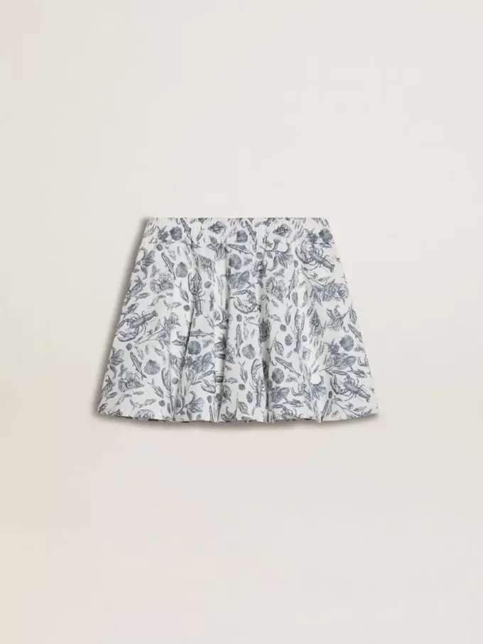 Falda blanca para niña con estampado azul Falda blanca para niña con estampado azul