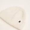 Gorro de lana blanco con estrella negra