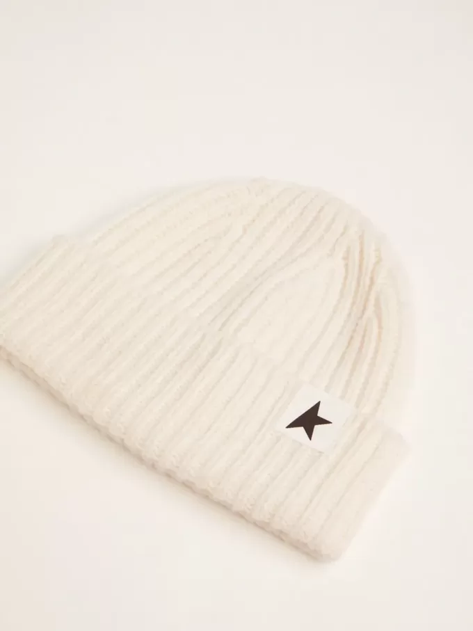 Gorro de lana blanco con estrella negra