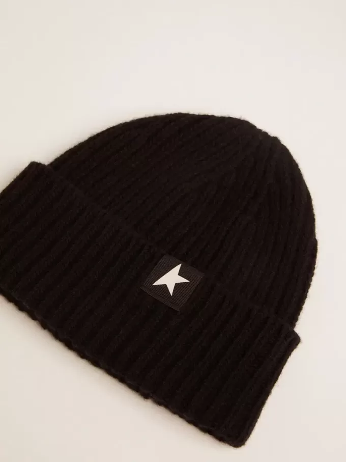 Gorro de lana negro con estrella blanca