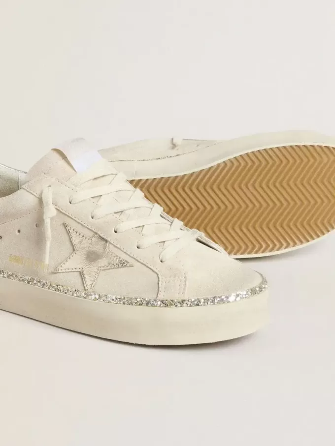 Hi Star en ante con estrella y lengüeta en el talón de piel metalizada plateada Hi Star en ante con estrella y lengüeta en el talón de piel metalizada plateada