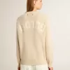 Jersey beige para mujer con las letras «Golden» en la espalda