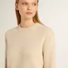 Jersey beige para mujer con las letras «Golden» en la espalda