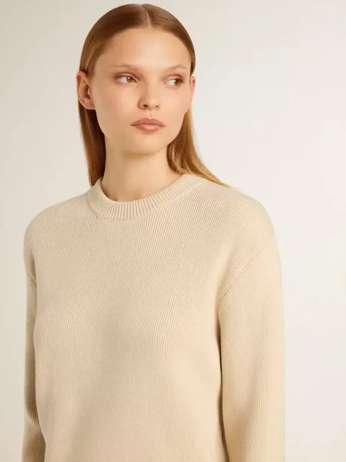 Jersey beige para mujer con las letras «Golden» en la espalda