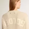 Jersey beige para mujer con las letras «Golden» en la espalda