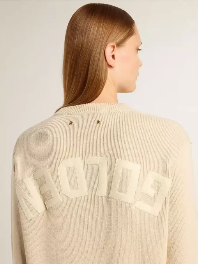 Jersey beige para mujer con las letras «Golden» en la espalda