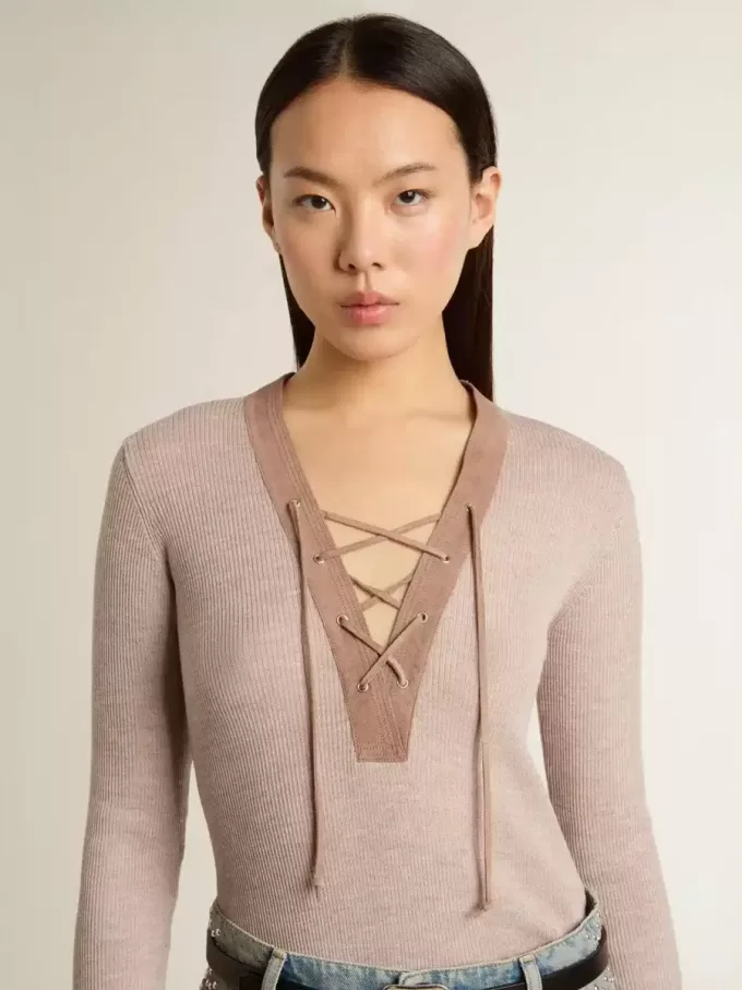 Jersey de lana beige con detalles de piel Jersey de lana beige con detalles de piel