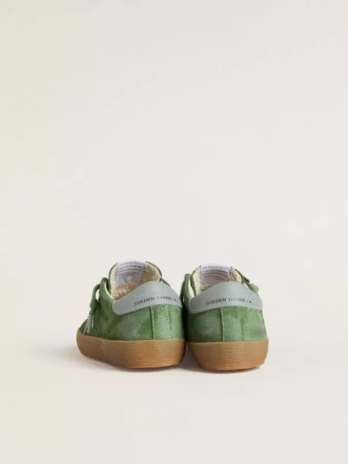 Junior Super-Star en ante verde con estrella azul claro y lengüeta en el talón