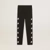 Leggings negros para niña con estrellas blancas en los laterales