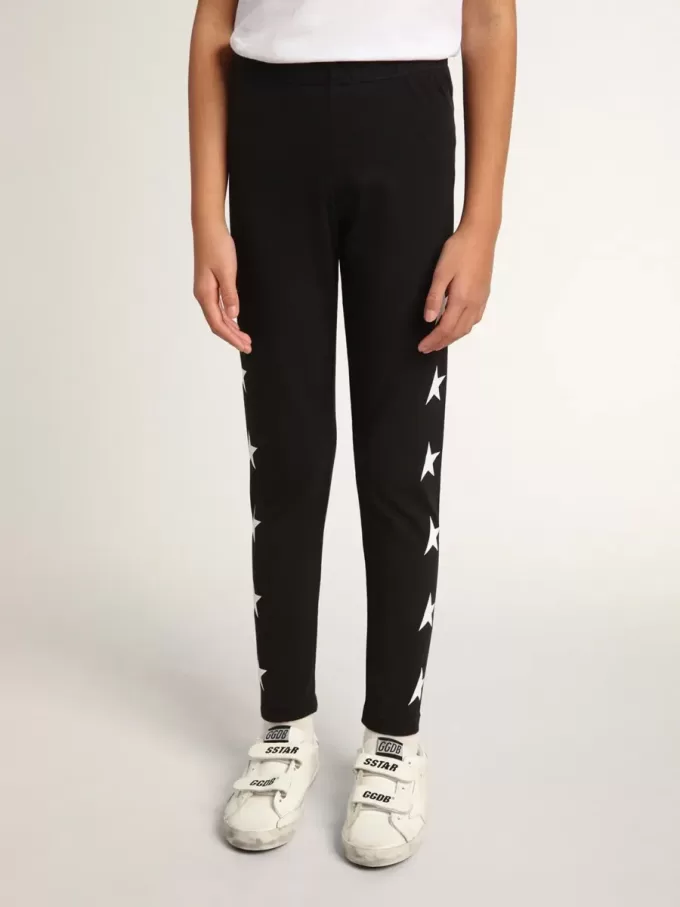 Leggings negros para niña con estrellas blancas en los laterales