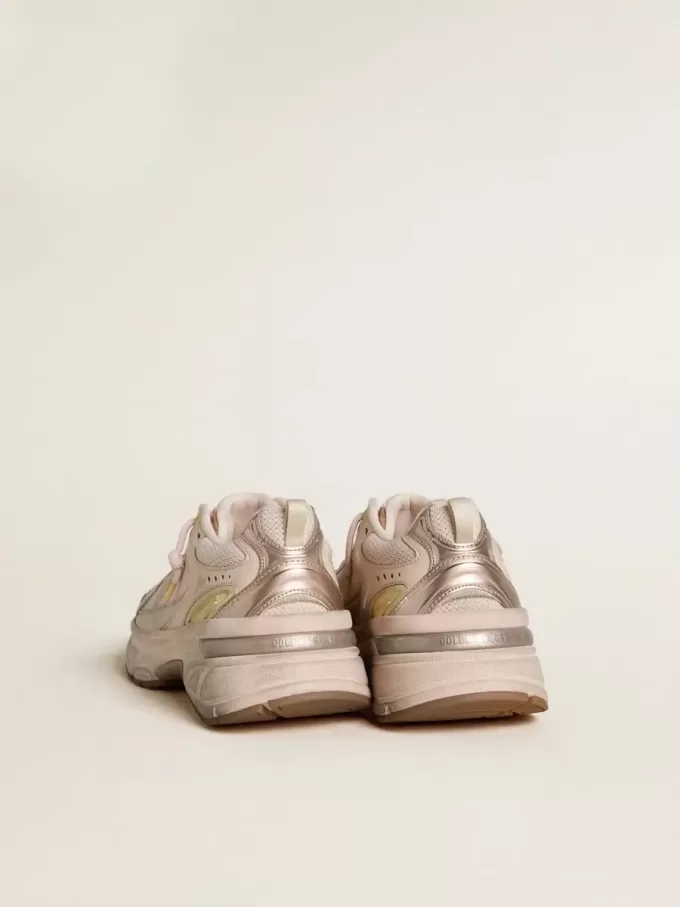 Lightstar para mujer con parte superior de piel rosa y malla y estrella rosa