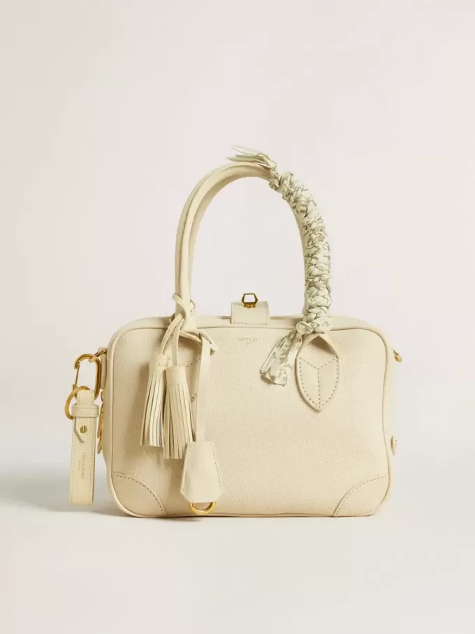 Llavero blanco desgastado