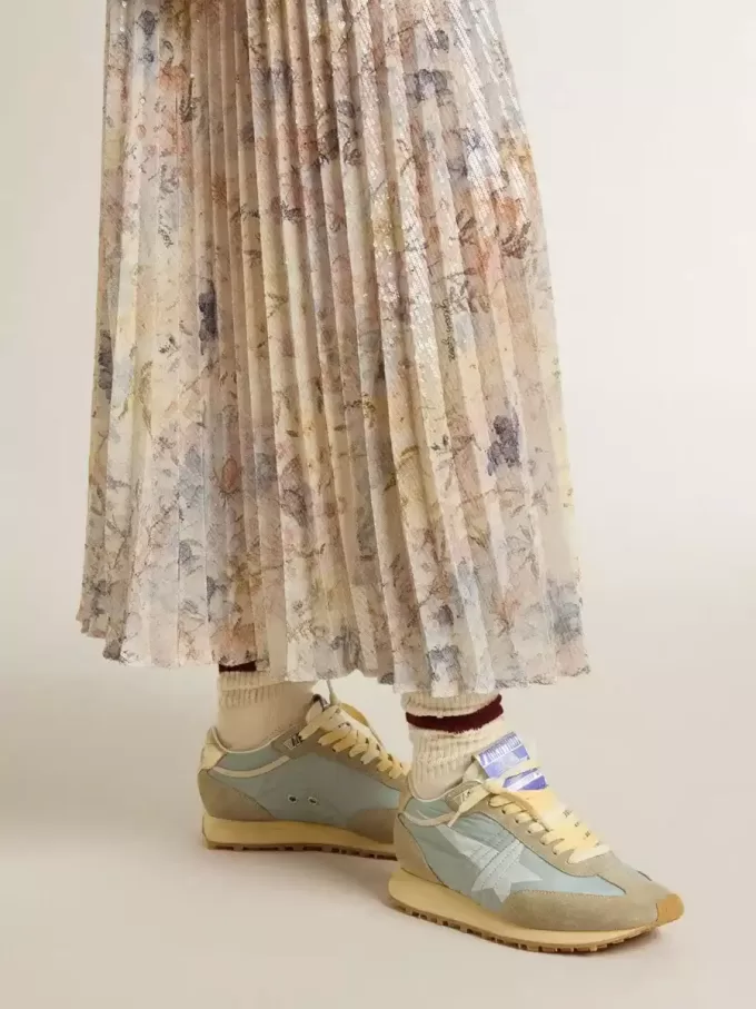 Marathon para mujer con parte superior de nailon azul claro y estrella azul pastel Marathon para mujer con parte superior de nailon azul claro y estrella azul pastel