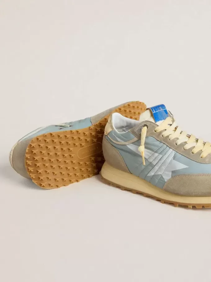 Marathon para mujer con parte superior de nailon azul claro y estrella azul pastel Marathon para mujer con parte superior de nailon azul claro y estrella azul pastel