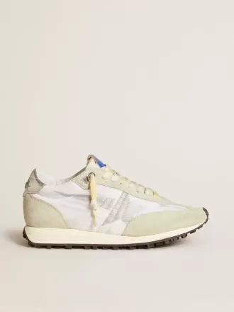 Marathon para mujer con parte superior de nailon blanco y estrella plateada