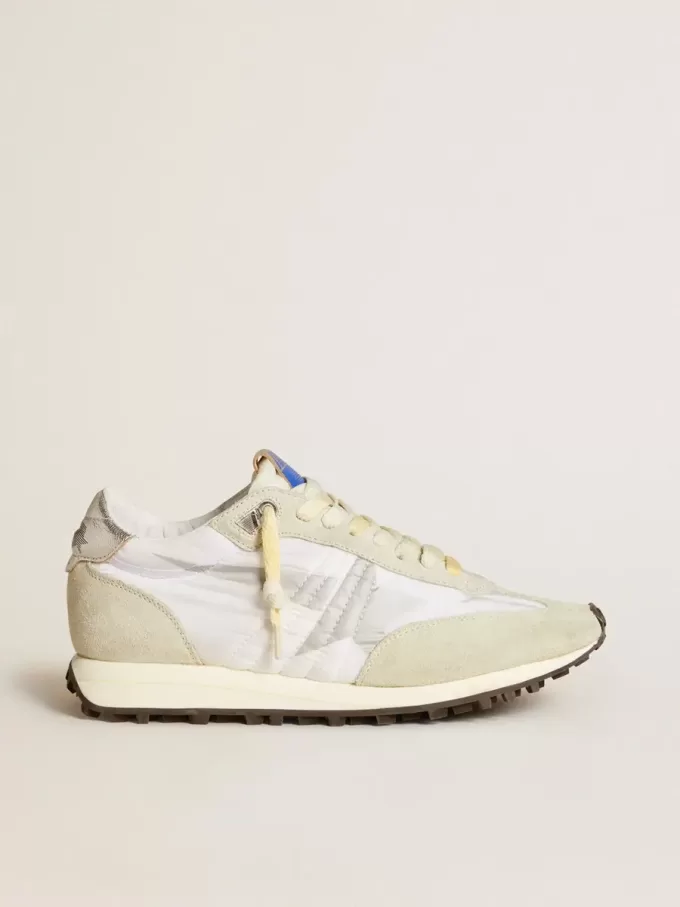 Marathon para mujer con parte superior de nailon blanco y estrella plateada