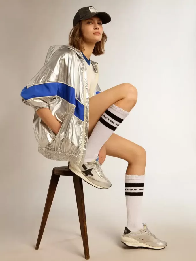 Marathon para mujer con parte superior de nailon ripstop plateado y estrella negra