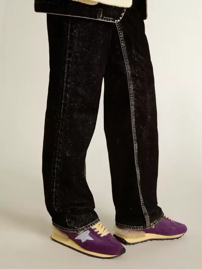 Maratón para mujer con parte superior de nailon morado y estrella blanca