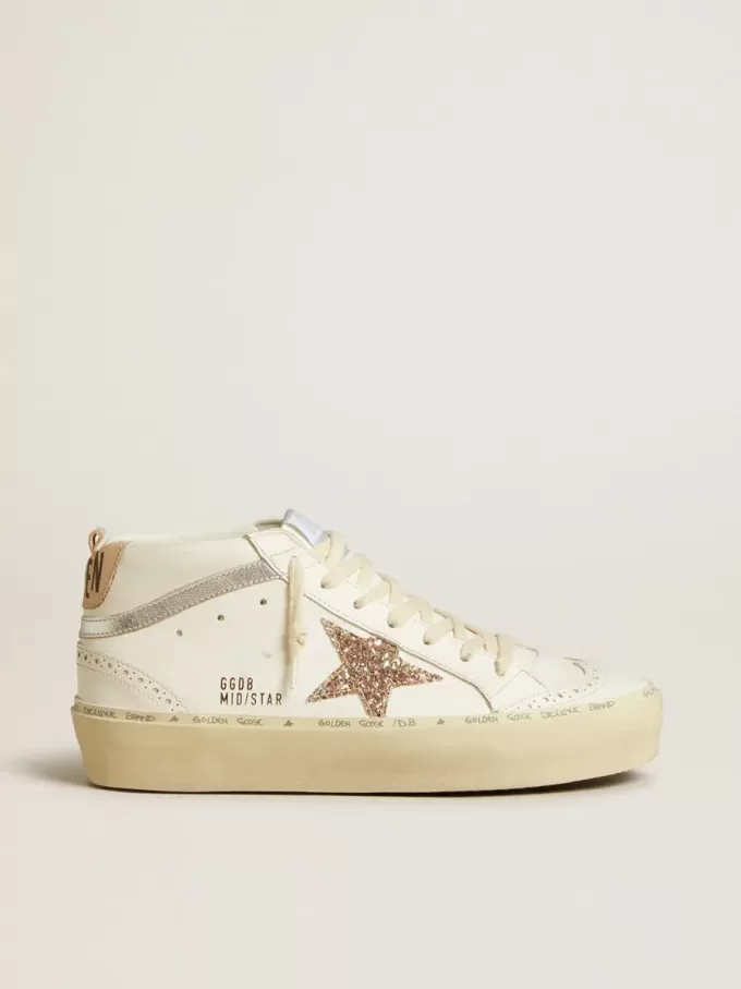 Mid Star con estrella brillante y detalle metálico plateado en piel