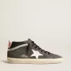 Mid Star en ante negro con estrella de cuero blanco y detalle plateado