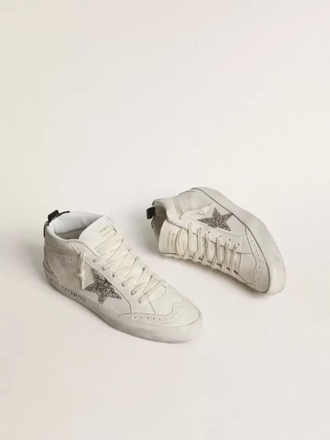 Mid Star para mujer con estrella plateada brillante y lengüeta laminada negra en el talón