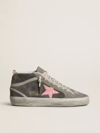 Mid Star para mujer en ante gris con estrella de piel laminada rosa.