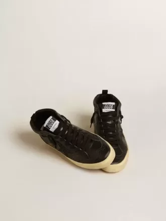 Mid Star para mujer en napa negra con estrella brillante negra y detalle de ante