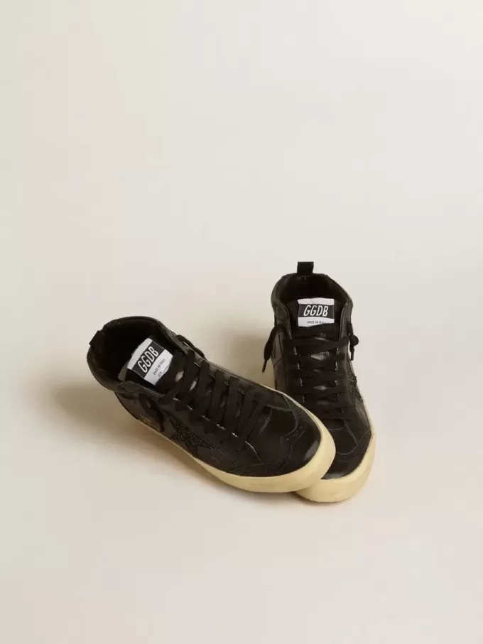 Mid Star para mujer en napa negra con estrella brillante negra y detalle de ante