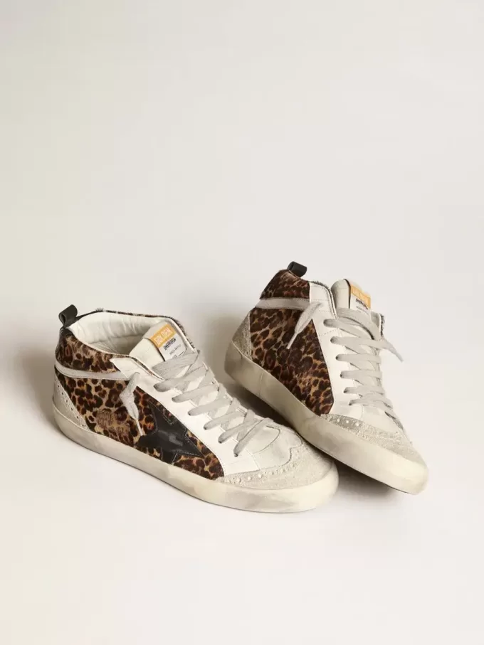 Mid Star para mujer en piel de potro con estampado de leopardo y estrella negra