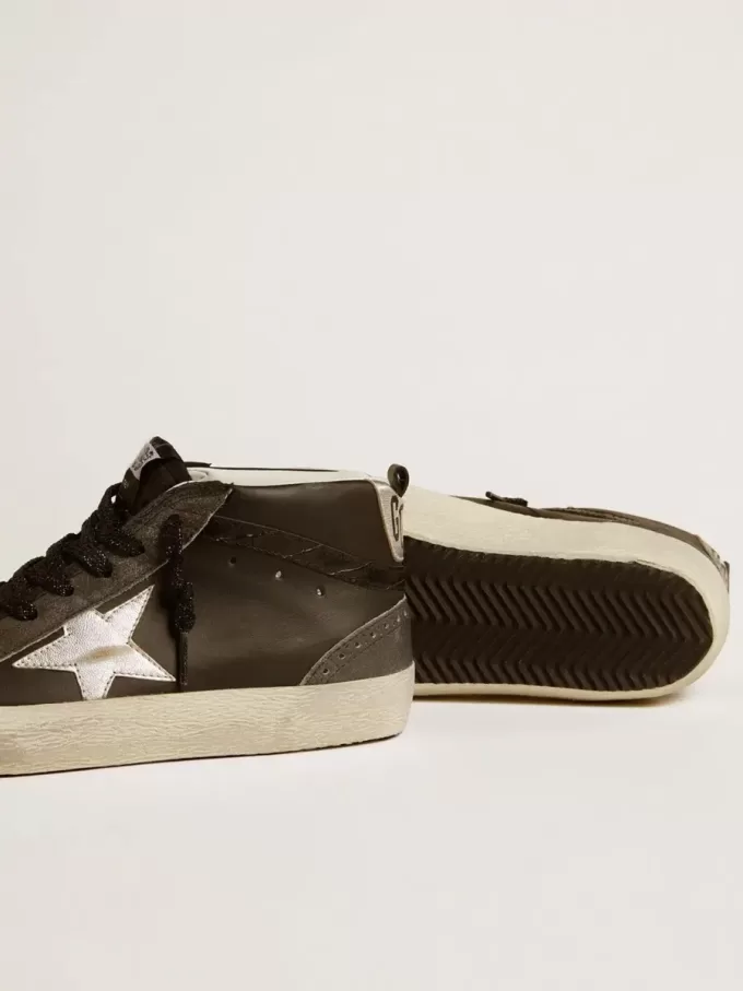 Mid Star para mujer en piel negra con estrella de piel metalizada plateada