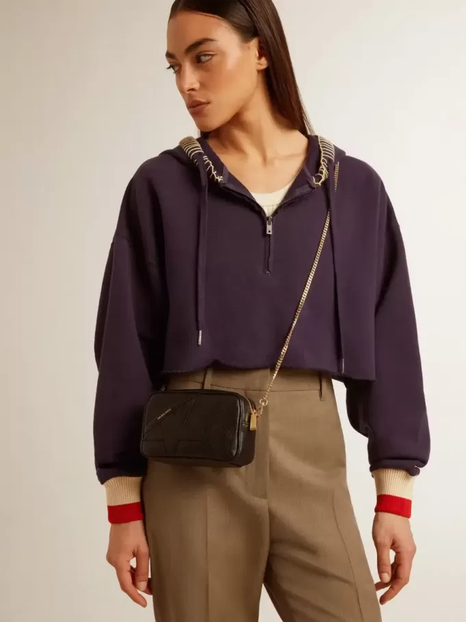 Mini bolso Star en piel negra con estrella tono sobre tono Mini bolso Star en piel negra con estrella tono sobre tono